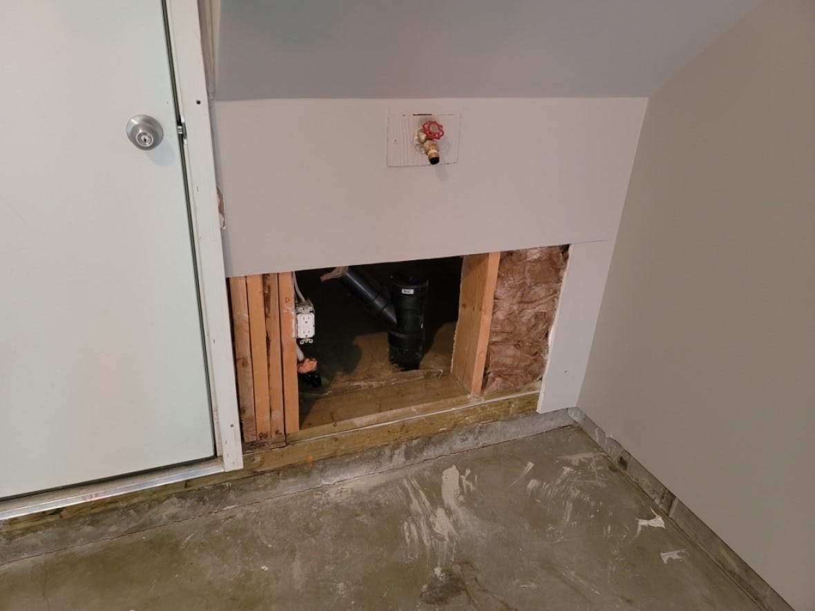 Calgary garage drywall repair - A 2 feet by 3 feet hole before fixed